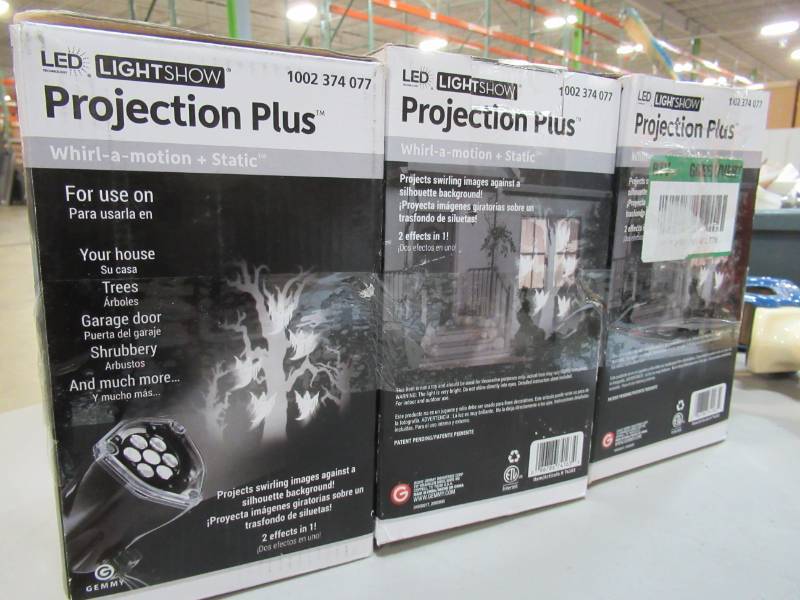 lot 54 image: Three LED Projection Plus Whirl-a-Motion Plus Static Ghost with Tree - New in Box