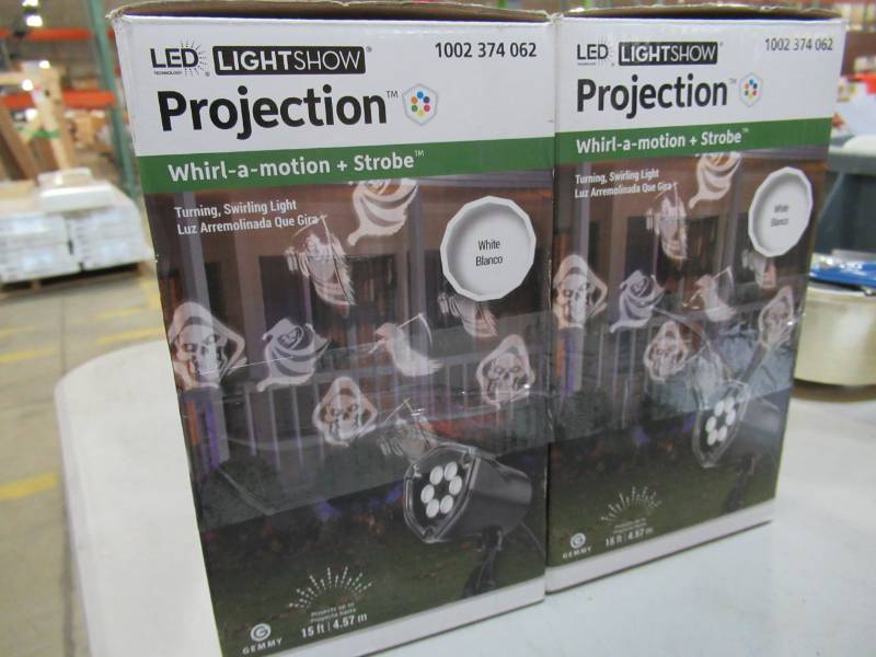 lot 58 image: Two LED Projection Halloween Strobe Gruesome Zombies and Reapers Spotlight - New in Box