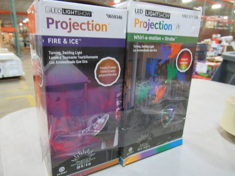 lot 59 image: Two Projectors Fire and Ice Purple Spotlight & Multicolor Ghosts - New in Box