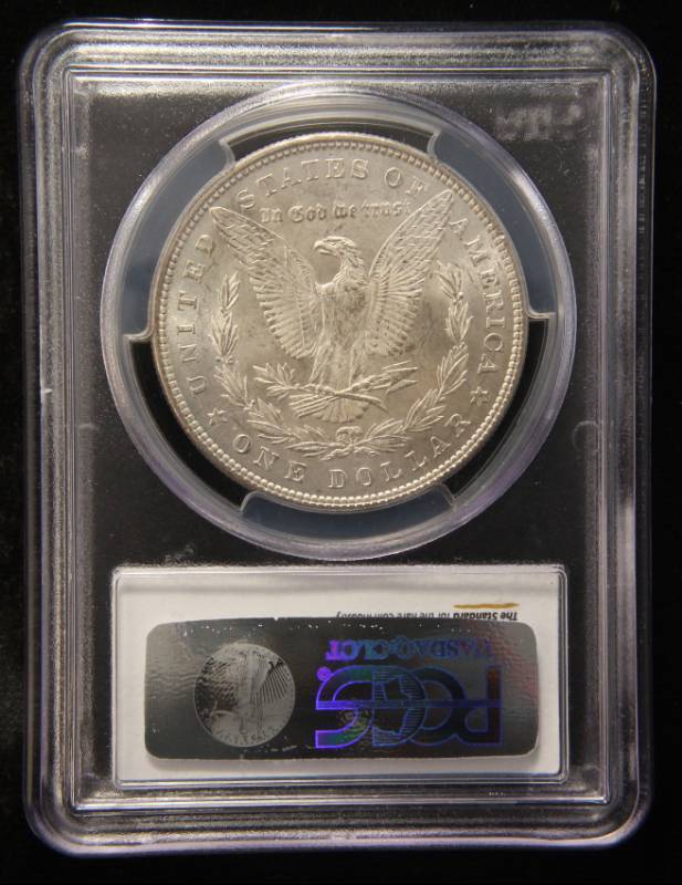lot 06 image: 1878 7TF REV OF 1879 MORGAN SILVER DOLLAR MS63 PCGS