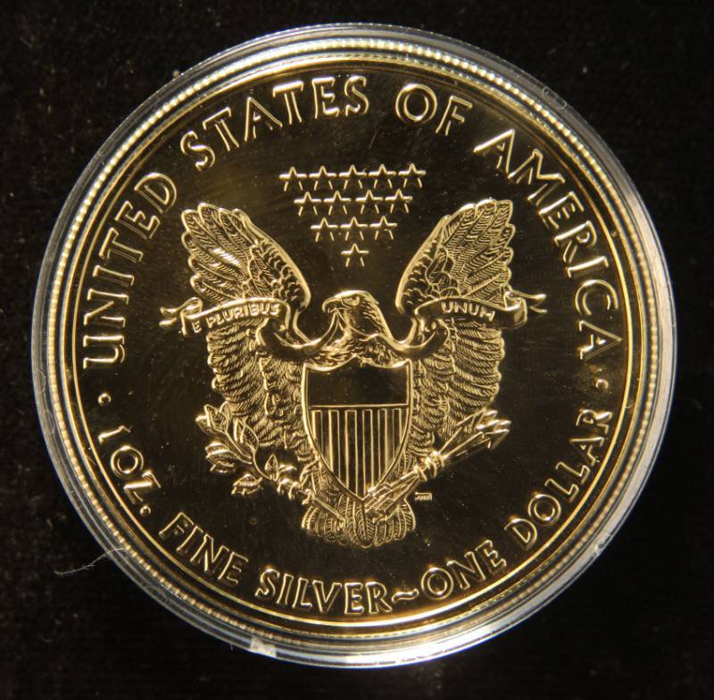 lot 60 image: 2010 GOLD PLATED AMERICAN SILVER EAGLE 1 TROY OZ. .999 FINE SILVER DOLLAR