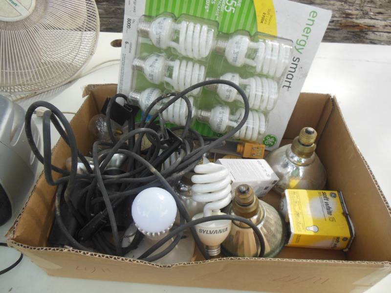 Box of light bulbs, floor fan and r...