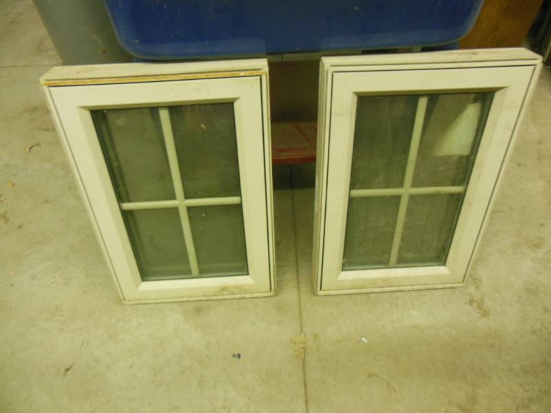 Pair of fish house or playhouse win...