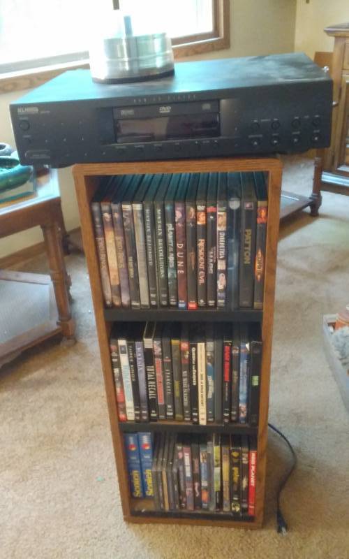 lot 3 image: KLH DVD Player, Swivel Media Stand With DVDs & VHS 12x12x32