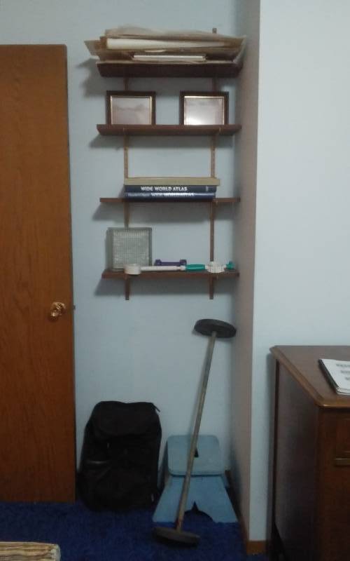 lot 21 image: Wall Shelves & Contents (Bring Screwdrivers To Remove), Weight Bar, Dumb Bells, Duffel Bag, Foot Stool