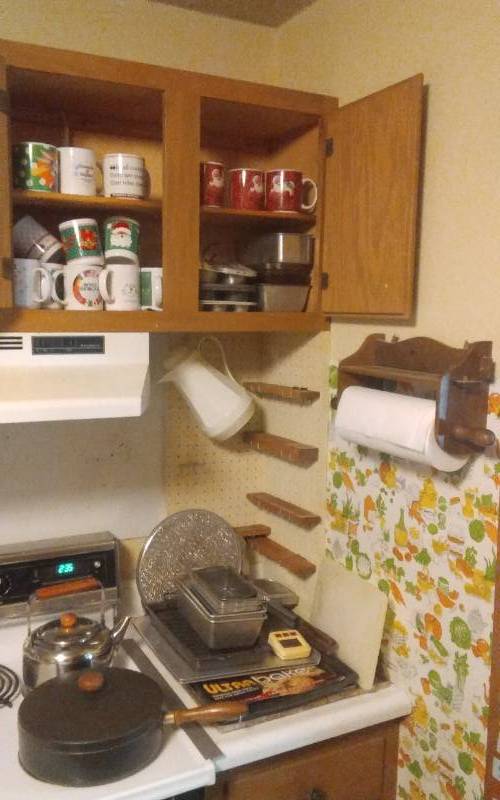 lot 49 image: Bake Ware, Coffee Mugs, Tea Pot, Coffee Server, Skillet With Lid, Paper Towel Holder