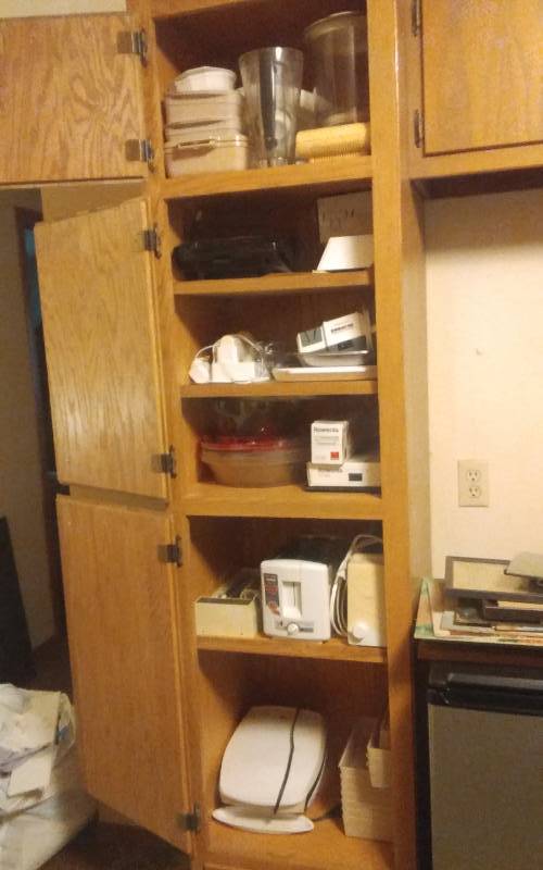 lot 56 image: Contents Of Tall Cupboard-Appliances & Refrigerator- No Shelves Or Freezer Door But Works