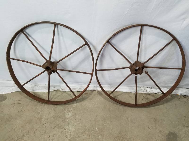 lot 10 image: Two vintage metal wheels