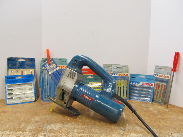 lot 85 image: BOSCH Jig Saw wMany Extra Blades