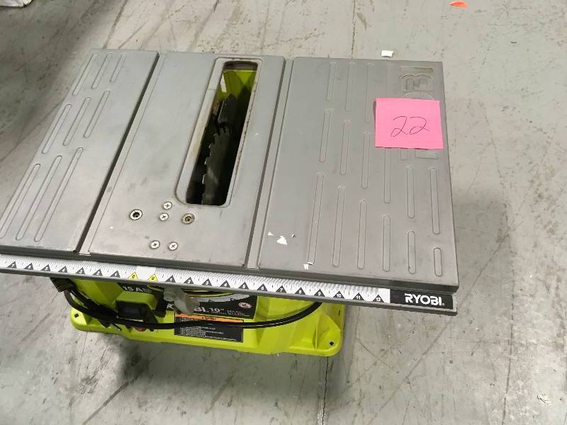 lot 22 image: Ryobi RTS10G 15 Amp 10 in. Table Saw  USED in working conditions missing parts
