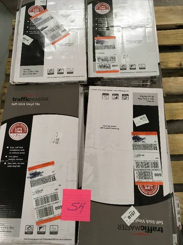 lot 54 image: TrafficMASTER 12x24 Gray Linear Travertine Vinyl Tile - 20 sq. ft. case   LOT OF 8 CASES not used
