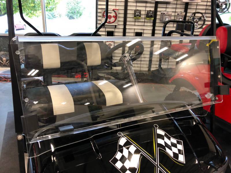 lot 9 image: Brand New, Never Opened Clear Folding Golf Cart Windshield fits a 1996 to 2013 EZ-GO TXT.