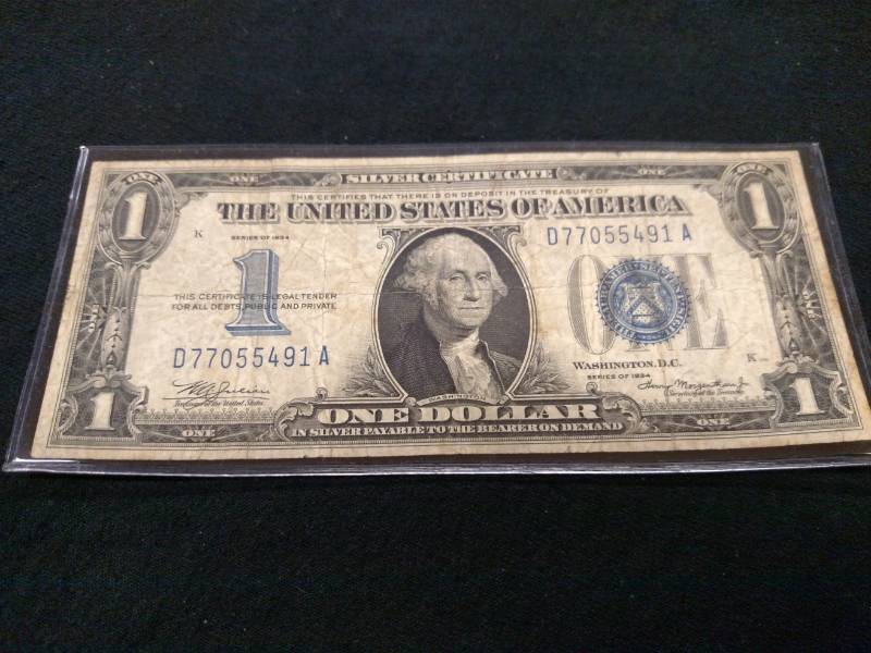 1934 Funny Back One Dollar Silver C...