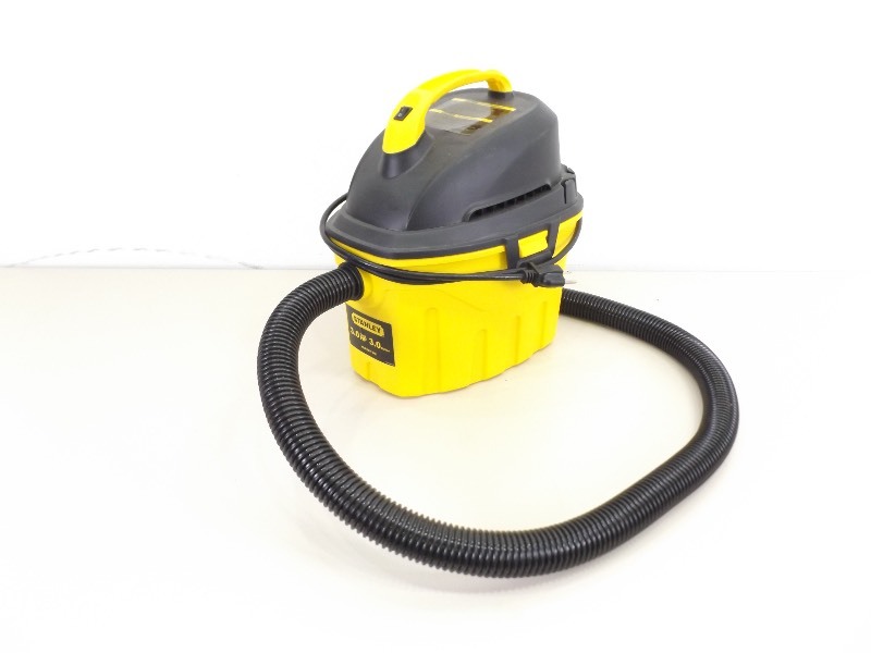 lot 76 image: WORKING Stanley Small Shop Vac