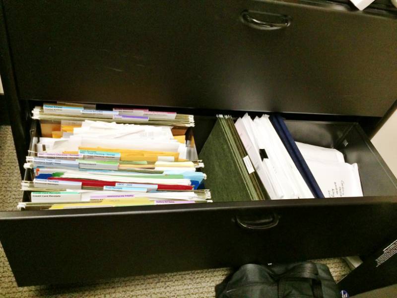 lot 54 image: Herman Miller Black 3 Drawer With Drop Down Overhead Locking Filing Cabinet & Center Organizing Storage Compartment - Heavy Duty High Quality Like New Condition