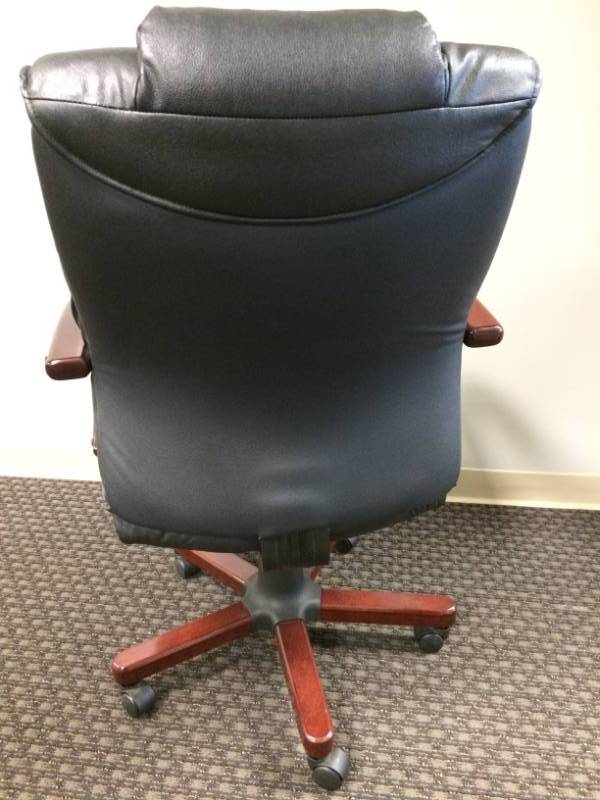 lot 31 image: Black Leather and Lacquered Wood Style Executive Office Chair - Excellent Condition With Exception To Wear On One Arm...Please See Pics