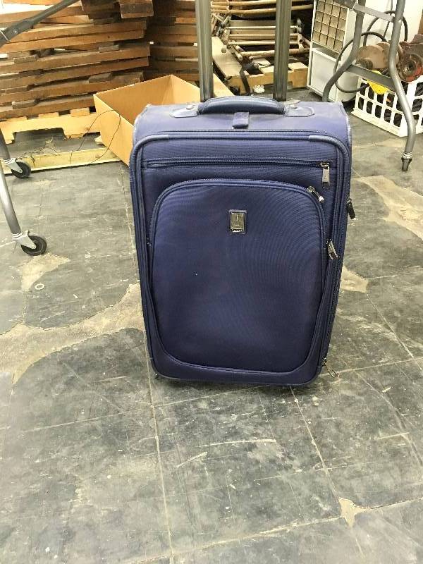 lot 88 image: Travel Pro 22 Carry On Luggage, Retail $99.99