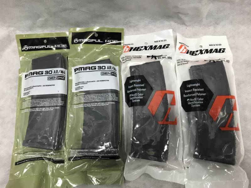 lot 12 image: Lot of 4 Magpul  Hexmag 30 round AR-15 .223 Magazines