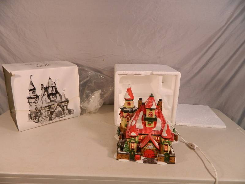 lot 79 image: Department 56 North Pole Series Lighted House