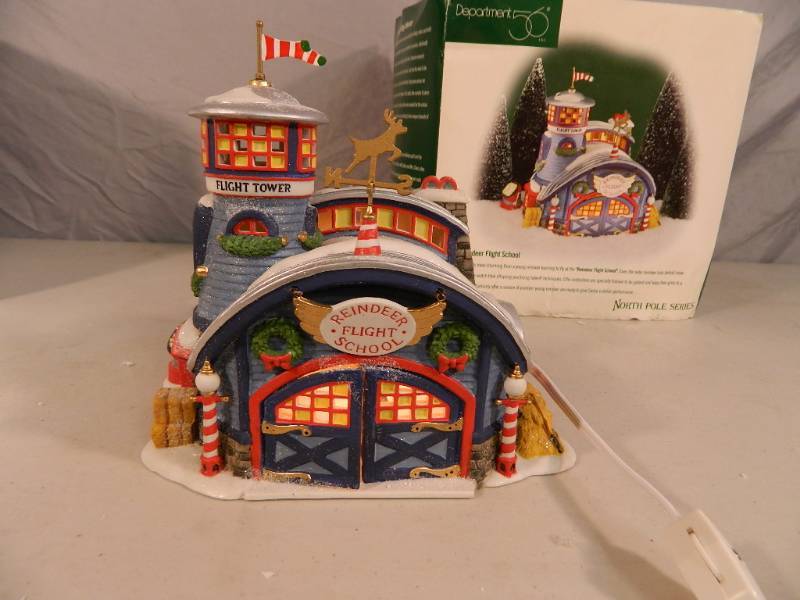 lot 80 image: Department 56 North Pole Series Reindeer Flight School