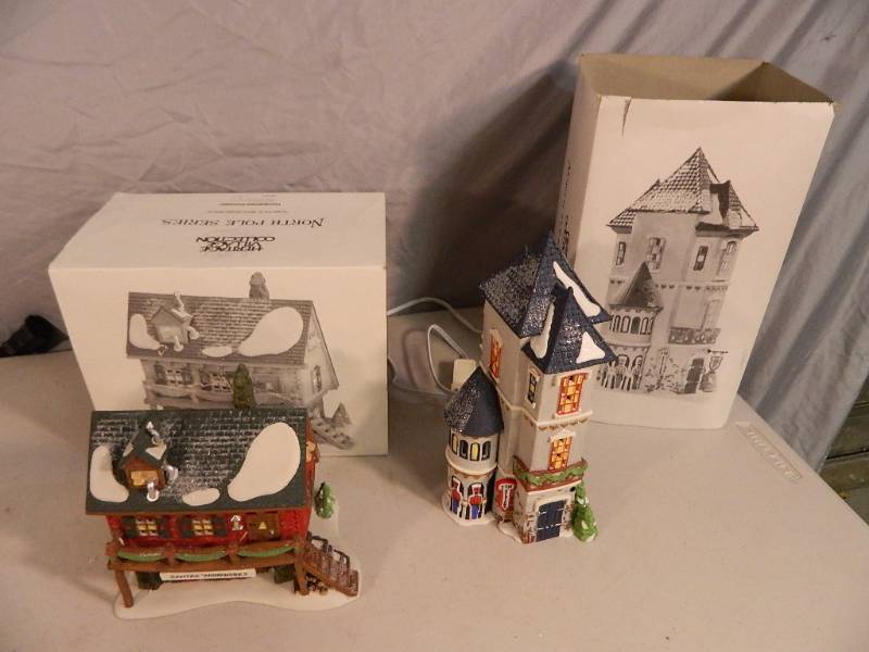 lot 82 image: Two Dept 56 North Pole Series Buildings