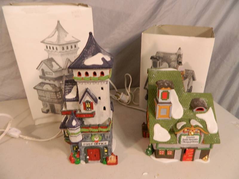 lot 92 image: Two Dept 56 North Pole Series Buildings