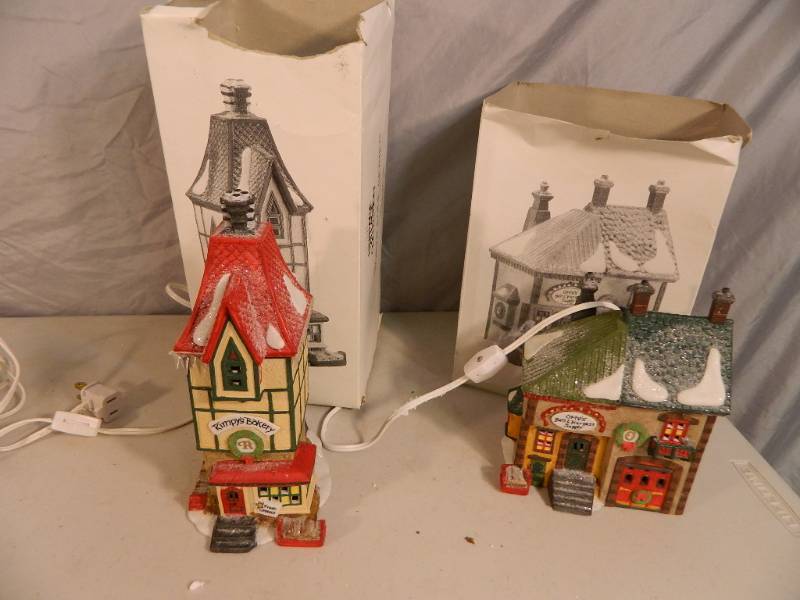 lot 100 image: Two Dept 56 North Pole Series Buildings