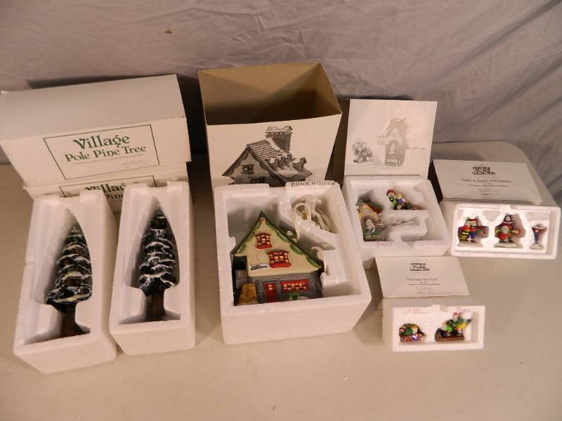 lot 101 image: Lot of Dept 56 North Pole Series Heritage Village