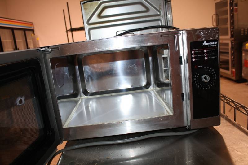 lot 32 image: Amana Dial Microwave - Model # ALD10D - 22 x 19 x 13-1