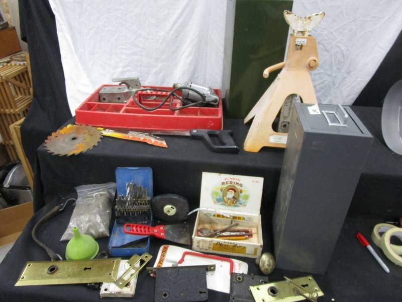 lot 32 image: 2 card catalogs, jack stand, skeleton keys and old door parts, drill bits, ram 14 drill works, 1 78 ball hitch and more