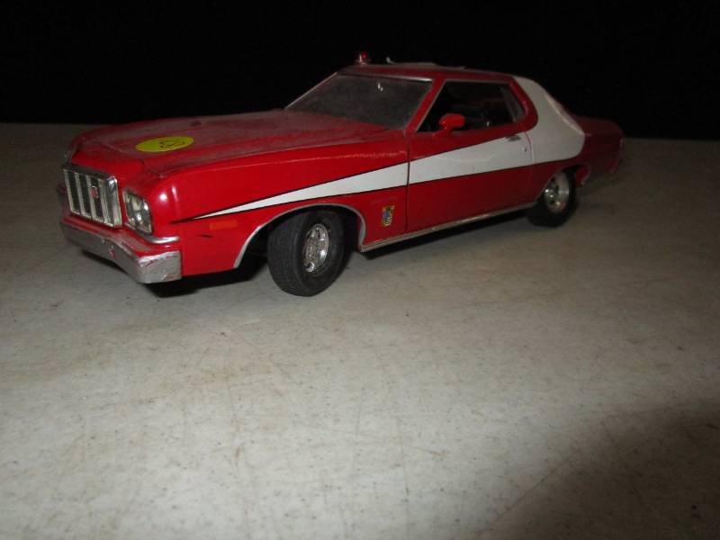 lot 87 image: Metal car Gran Torino has some damage