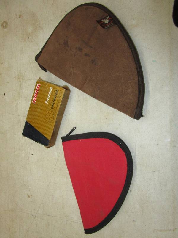 lot 119 image: 2 hand gun cases and a box of 308 shells missing 1 19ct