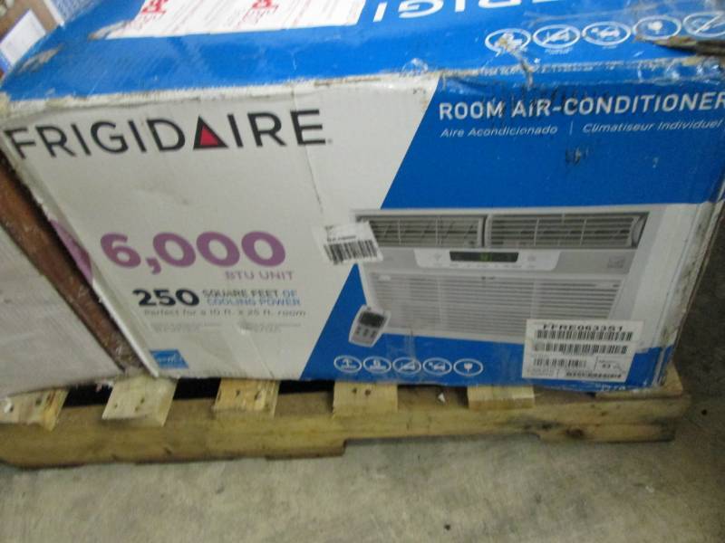 lot 23 image: Frigidaire 6000 BTU Window AC open...