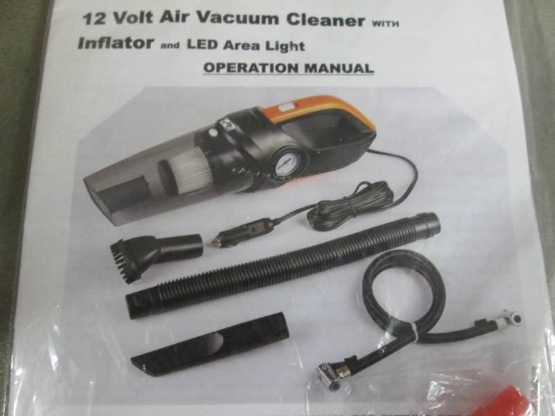 lot 229 image: 12 Volt Vacuum Cleaner open box, un...