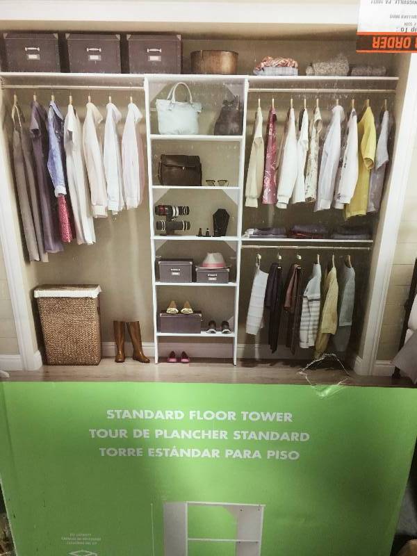 lot 3 image: Style 15 in. D x 25 in. W x 82 in. H White Melamine Floor Mount 6-Shelves Closet System not used