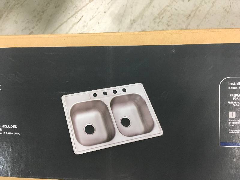 lot 25 image: Swift Install All-in-One Drop-In Stainless Steel 33 in. 4-Hole Double Bowl Kitchen Sink Kit not used