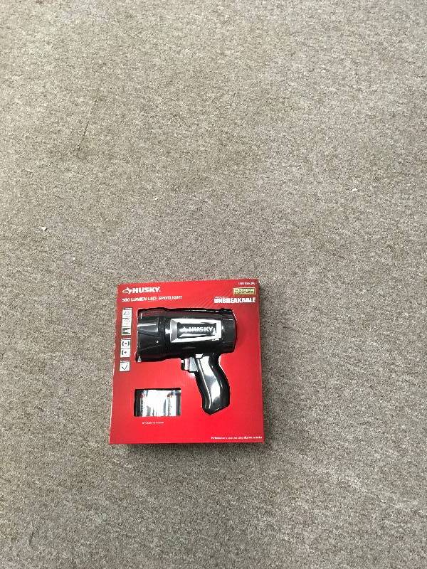lot 16 image: HUSKY 500 Lumen LED SPOTLIGHT 1001 596 206 Virtually Unbreakable WITH BATTERIES not used