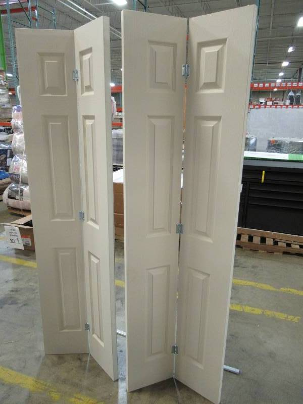 lot 43 image: Jeld-Wen 24 in. x 80 in. Colonial Primed Textured Molded Composite MDF Closet Bi-fold Door