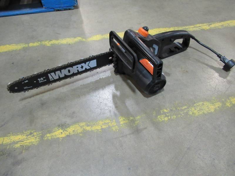 lot 99 image: Worx 14 in. 8 Amp Electric Chainsaw.Lightweight, Model WG305