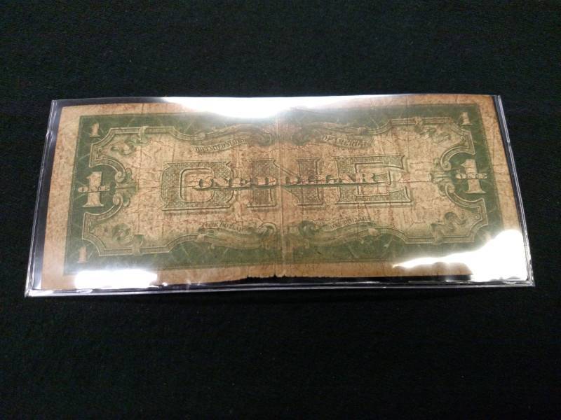1934 Funny Back One Dollar Silver C...