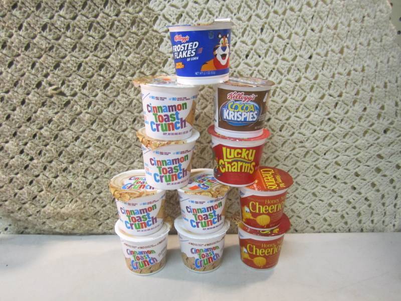 lot 98 image: 11 Misc Single Serve Cereal Cups  C...