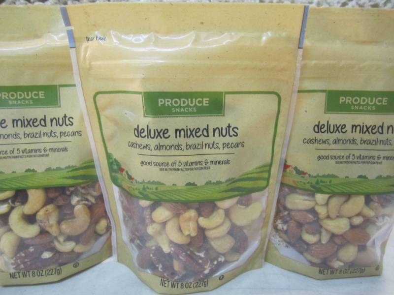 lot 205 image: 4 Bags of Deluxe Mixed Nuts Best by...