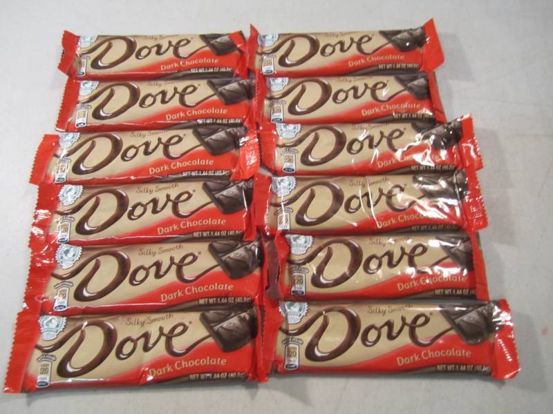 lot 214 image: 12 Dove Dark Chocolate Candy Bars B...