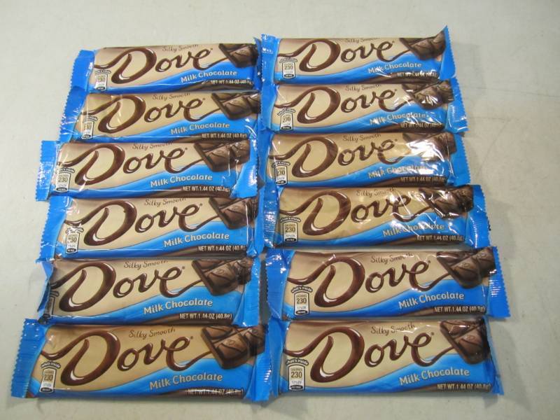 lot 215 image: 12 Dove Milk Chocolate Candy Bars B...