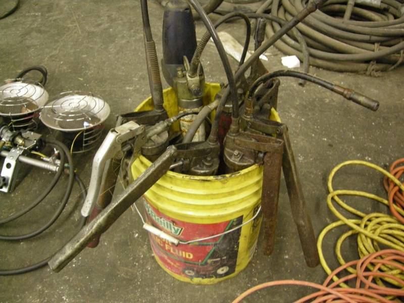 lot 141 image: Bucket of Grease Guns