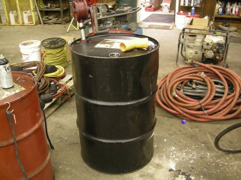 lot 251 image: Empty 55 Gallon OIl Barrel and Pump