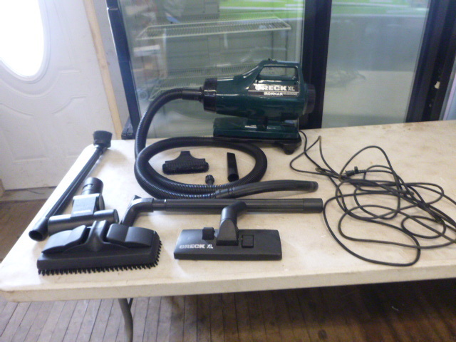 lot 64 image: Orek XL Ironman Vacuum with Attachments