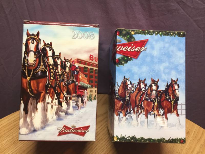 lot 31 image: 2008 & 2009 Budweiser Holiday Steins
