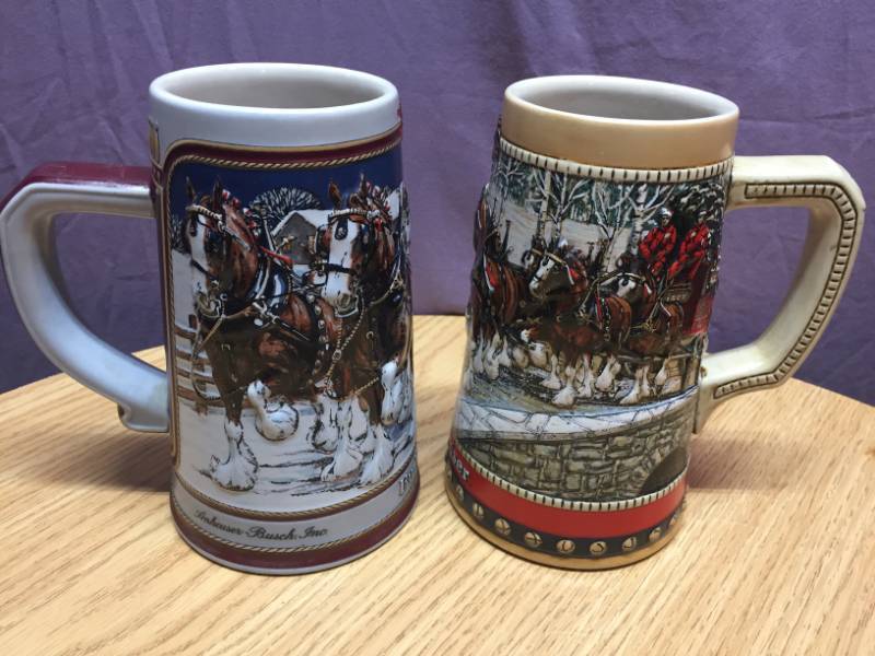lot 39 image: 1988 & 1989 Budweiser Holiday Steins