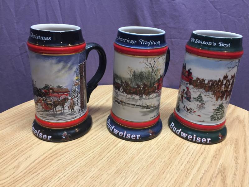 lot 40 image: 1990, 1991 and 1992 Budweiser Holiday Steins
